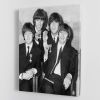 The Beatles sitting with their MBEs Canvas Print or Poster